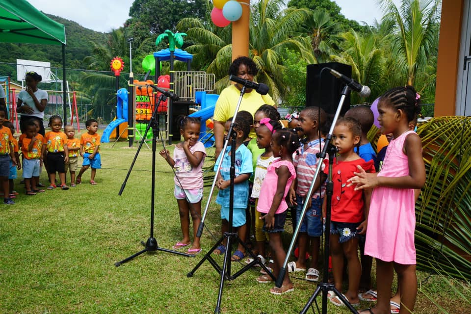 Kids singing at opening